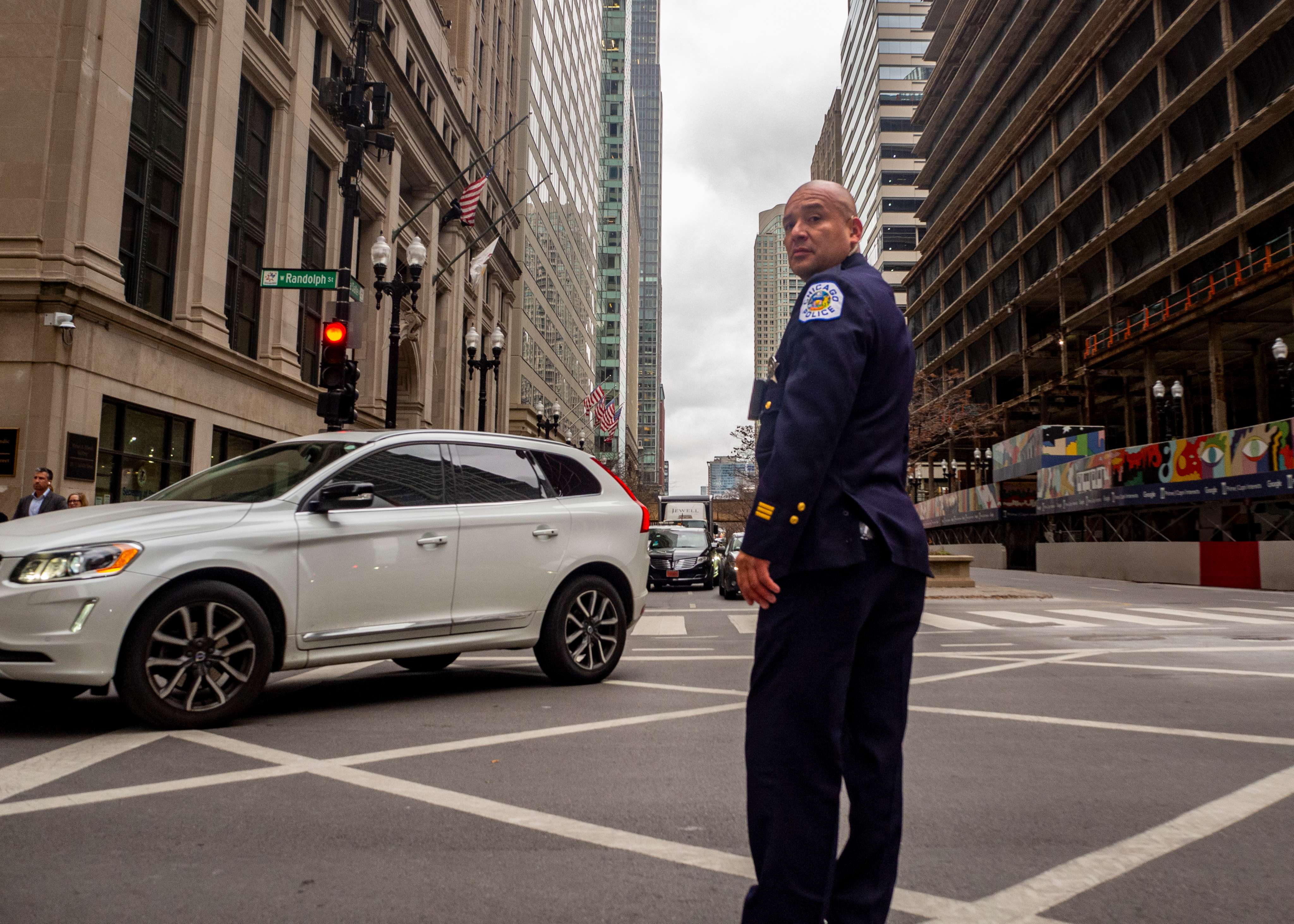 Chicago police officer directing traffic on downtown street