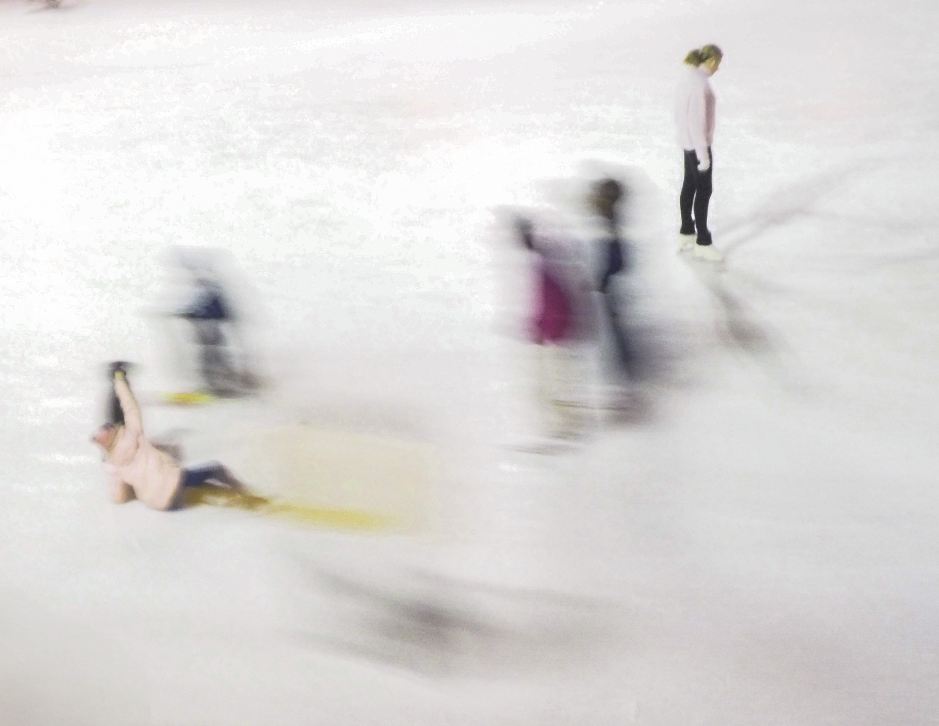 Abstract motion blur of ice skaters in Chicago